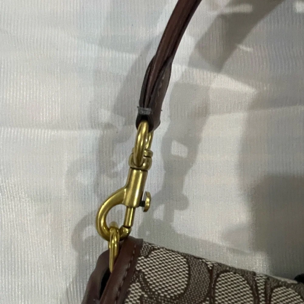 Coach Brown Signature Canvas Buckle Shoulder Bag